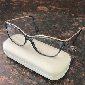 Marc Jacobs Black and Gold Glasses with Vintage-Inspired Design